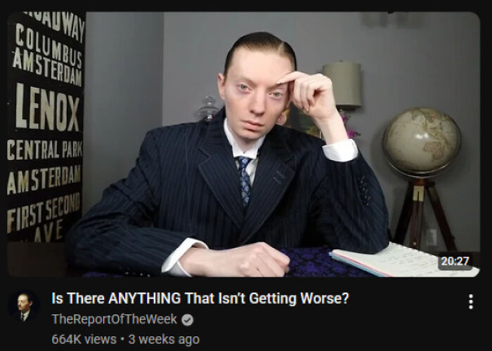 A man in a suit from TheReportOfTheWeek YouTube channel, discussing products and services getting worse and more expensive.