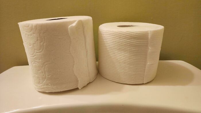 Two rolls of toilet paper, illustrating products and services getting worse while getting more expensive.