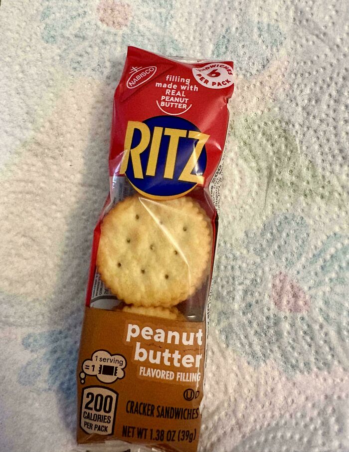 A single-serving package of Ritz peanut butter crackers, demonstrating how products got worse while getting more expensive.
