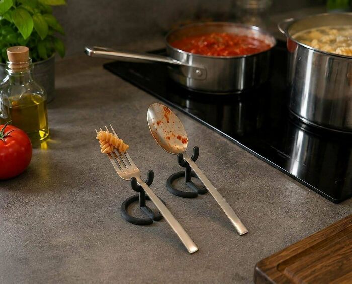 Utensil rests for a fork and spoon, a clever solution people needed and printed with their 3D printers for a tidy kitchen.