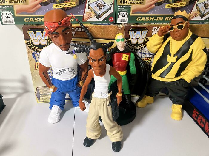 Custom 3D printed action figures of rappers and Robin, showcasing items people printed with their 3D printers.