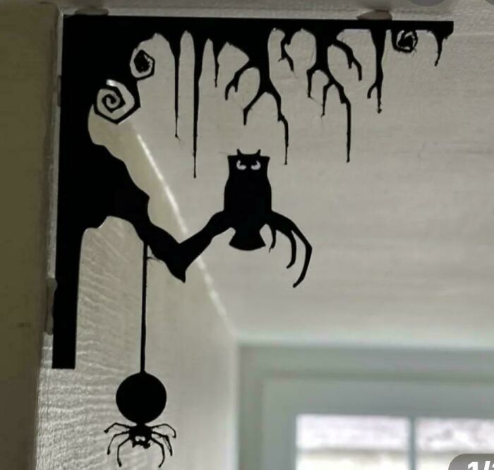 A spooky, silhouetted 3D printed Halloween decoration featuring an owl, spider, and bare tree branches.