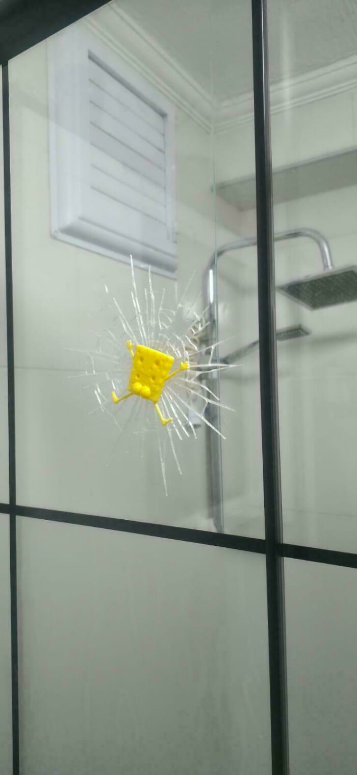 A humorous 3D-printed Spongebob Squarepants figure creating a cracked-glass effect, illustrating fun items printed with 3D printers.