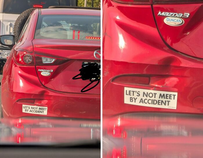 Chaotic sign on a red Mazda3 bumper reads 'LET'S NOT MEET BY ACCIDENT' with a dent above, questioning reality.