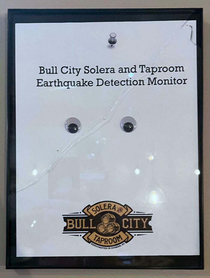 A chaotic sign with googly eyes for an earthquake detection monitor.