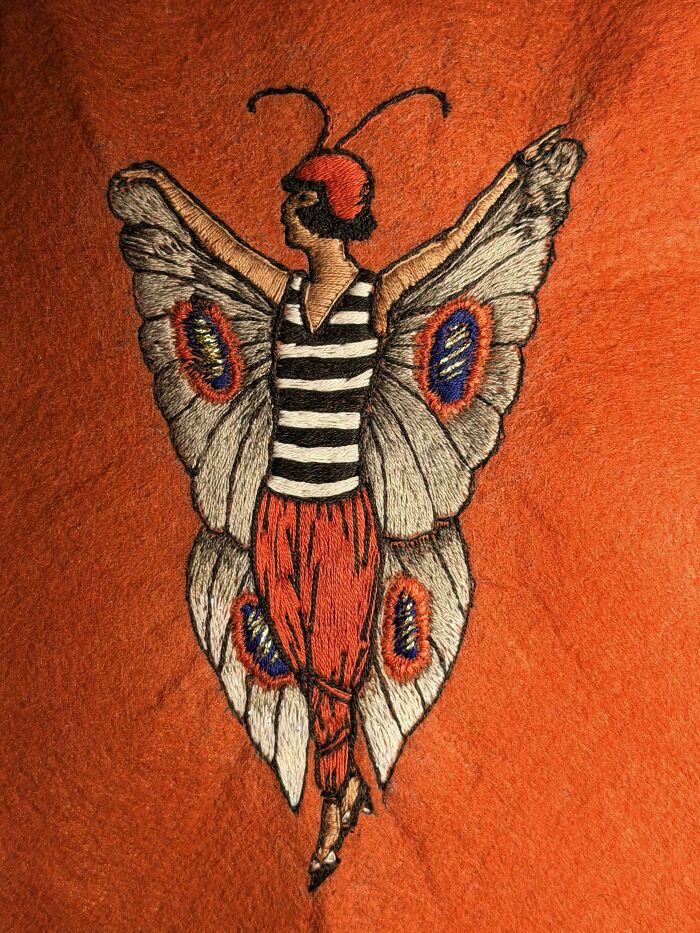 Vintage butterfly girl design hand-stitched onto orange felt as one of many creative embroidery projects
