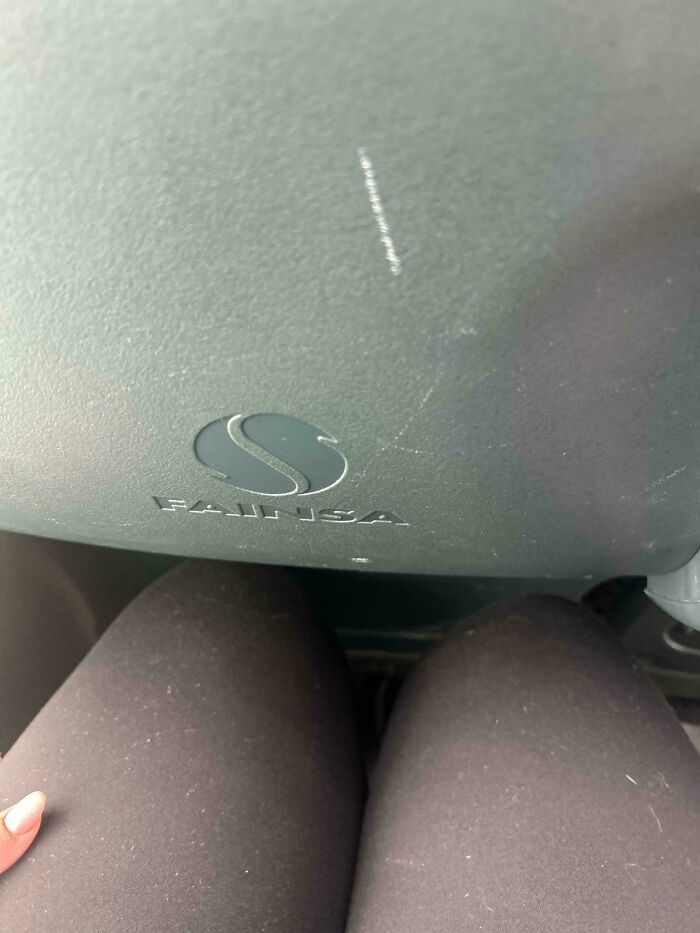 Extremely cramped legroom on a bus, showing challenging public transport interactions.