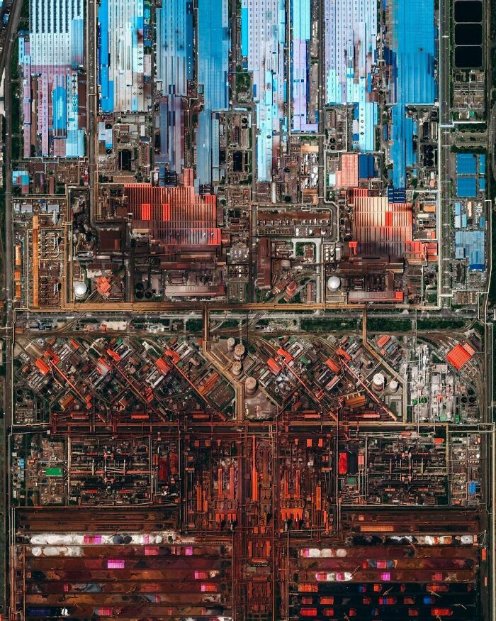 Symmetrical overhead view of a massive industrial complex showcasing efficient best infrastructure.