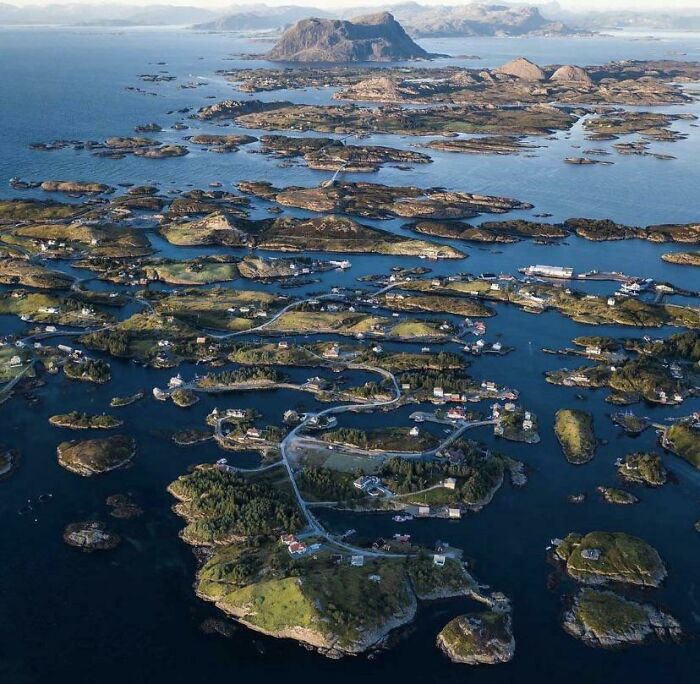Aerial view of roads connecting tiny islands, a marvel of coastal world best infrastructure.