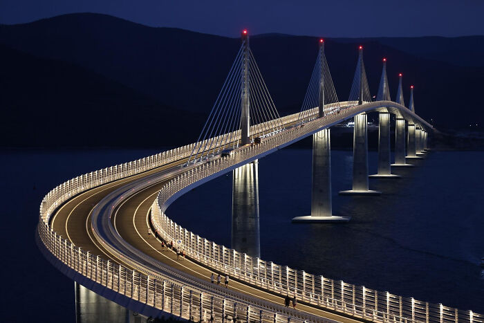 The Peljesac Bridge in Croatia lit up at night, displaying world's best infrastructure