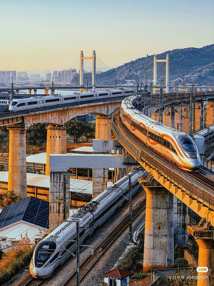 High-speed trains on elevated multi-level tracks showcasing world's best infrastructure