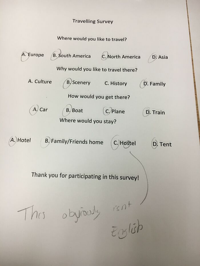 A travelling survey sheet where teachers marked a student's answer hostel with a note saying it isn't English.