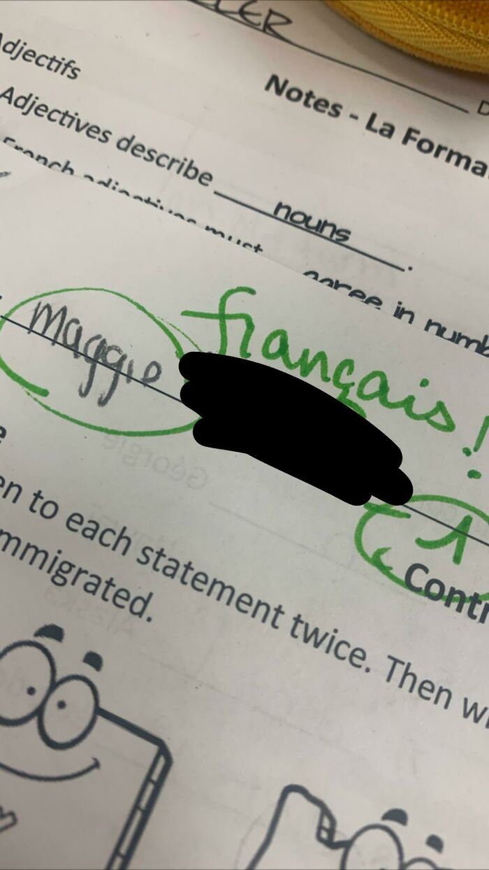 A French worksheet graded by strict teachers, correcting a minor error with a large green pen circle.