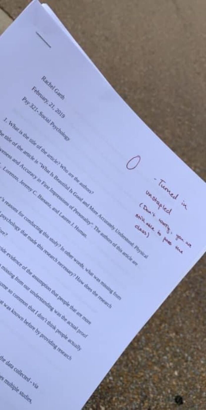 A social psychology paper marked with a zero for being unstapled, showing how some teachers can be strict.