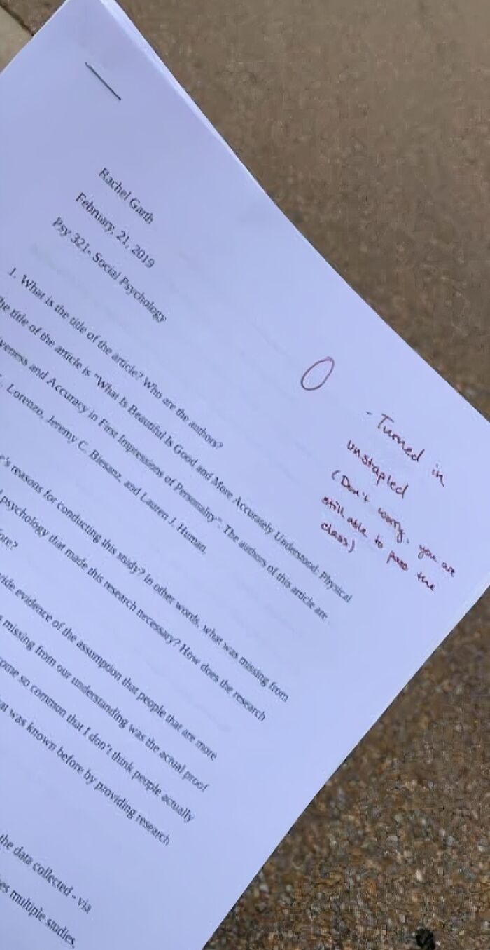 A social psychology paper marked with a zero for being unstapled, showing how some teachers can be strict.