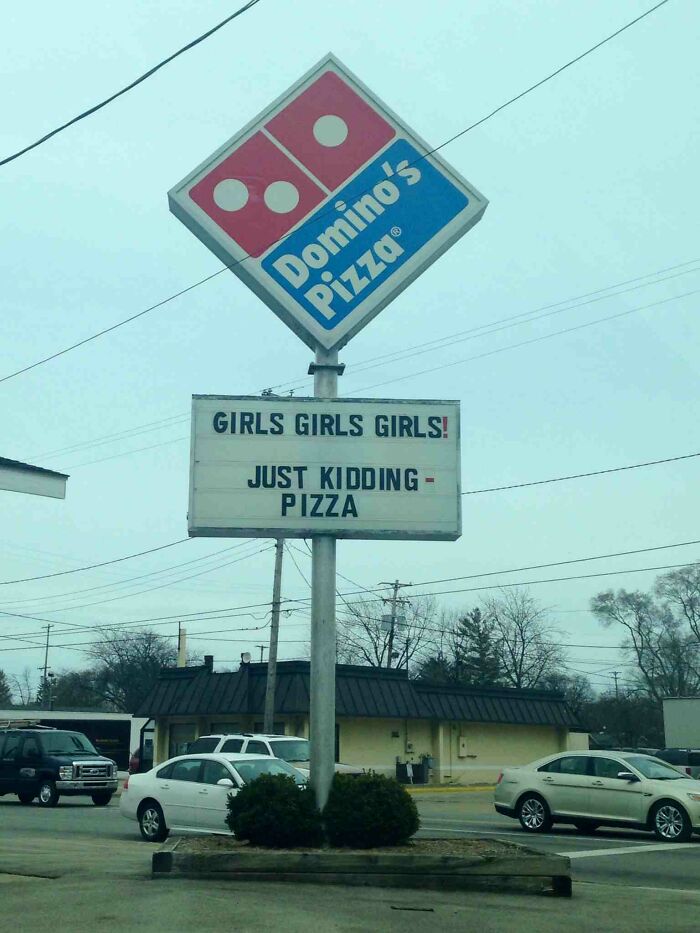 Domino's Pizza sign with humorous girls girls girls joke