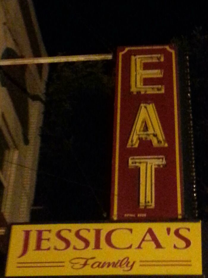 Funny eat sign at Jessica's family restaurant
