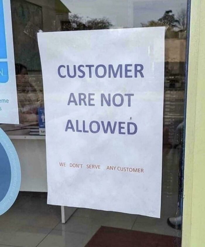 Funny sign stating customers are not allowed and no customers served