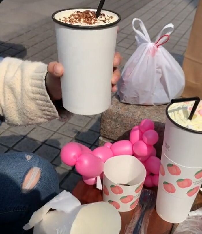 Double-walled cup design where the inner cup slips out, showing terrible product design