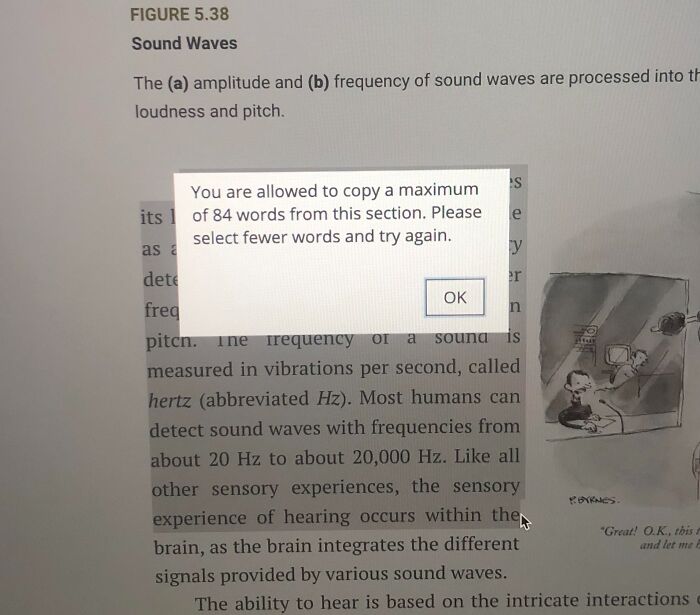 An e-textbook popup restricting text copying to a maximum of 84 words, showing terrible product design.
