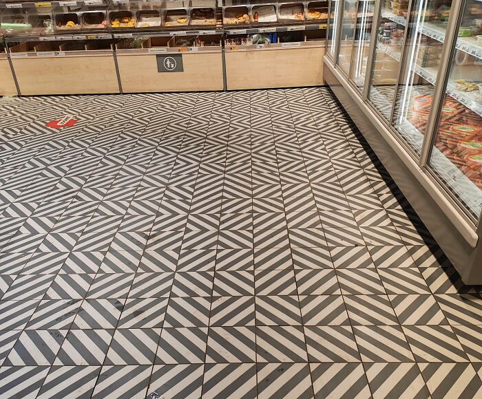 A confusing supermarket floor pattern showcasing terrible product design