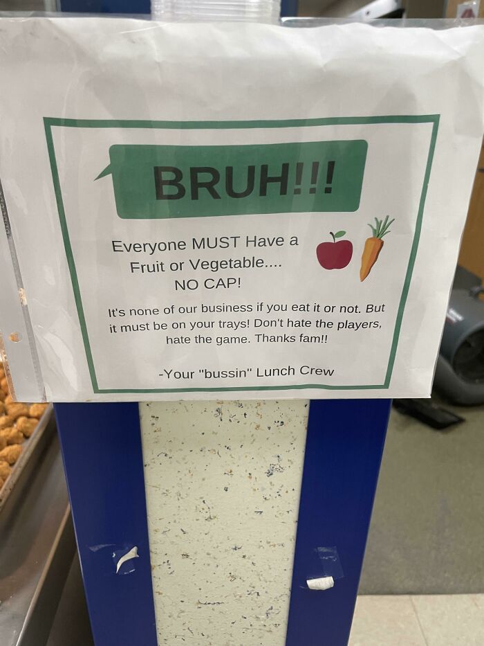Humorous lunch sign requiring a fruit or vegetable on trays with playful language
