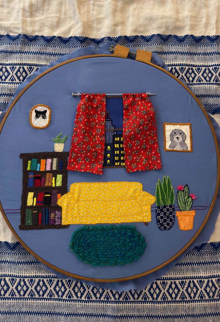 Colorful embroidery projects depicting a cozy living room scene with a yellow couch.