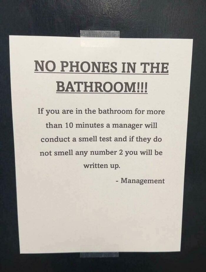 No phones in bathroom sign warns of smell test for lingering too long