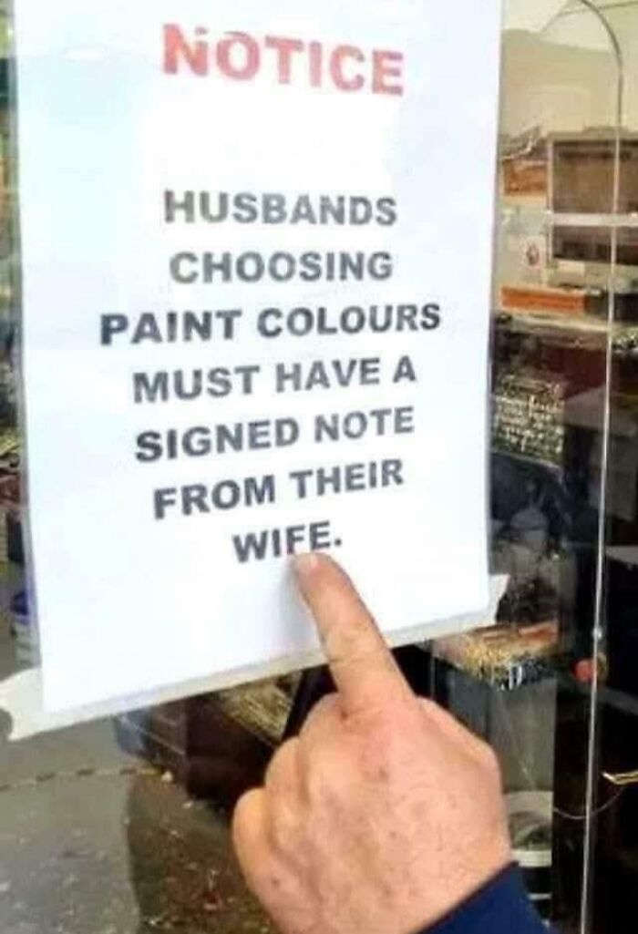 Unhinged sign requiring husbands to have wives note for paint colours