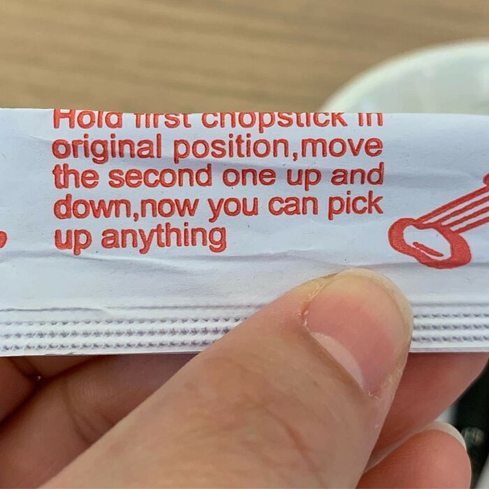 Chopsticks instructions with humorous unclear steps printed on wrapper