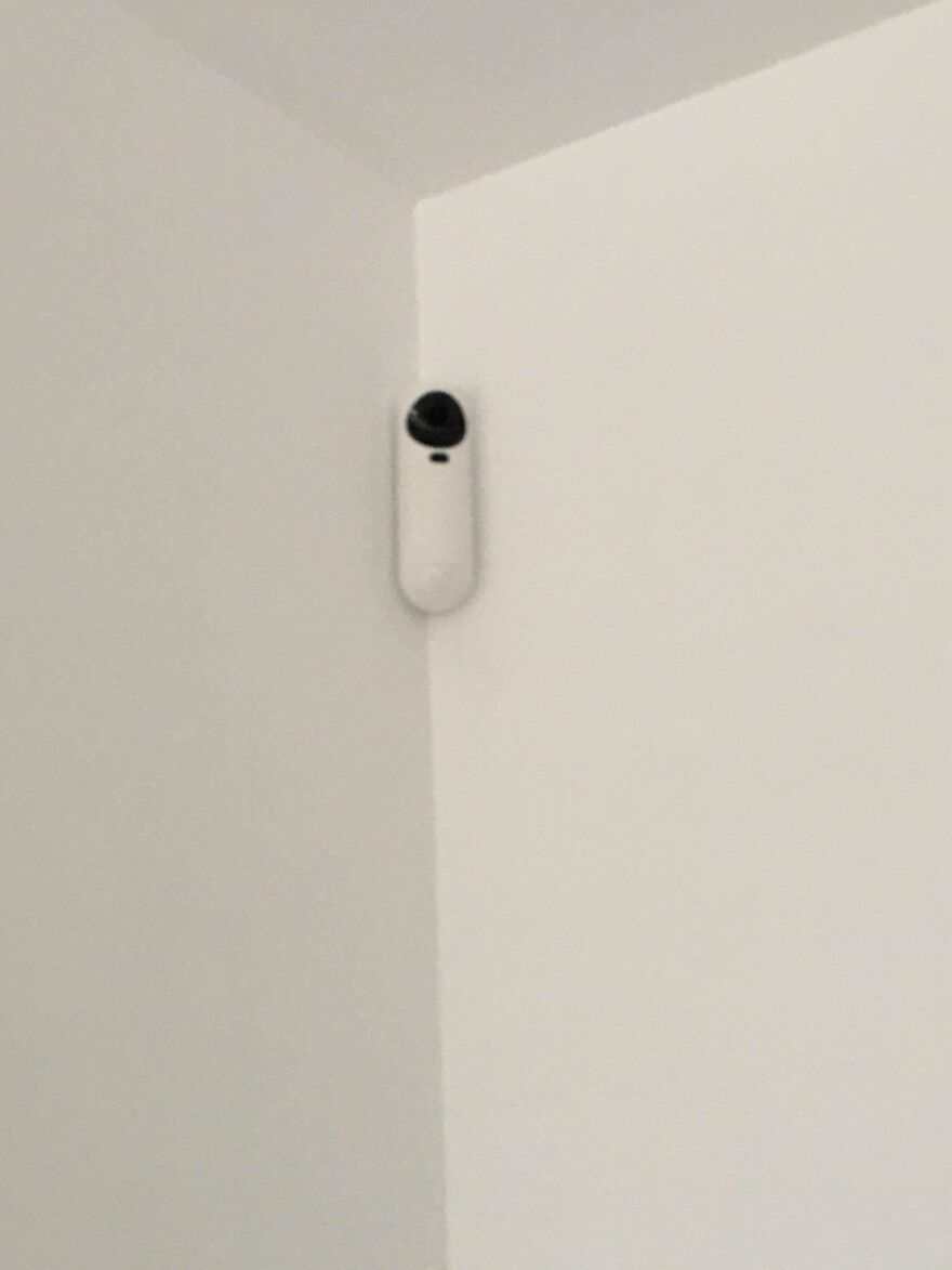 Hidden surveillance camera in a corner revealing hotel and Airbnb privacy fail