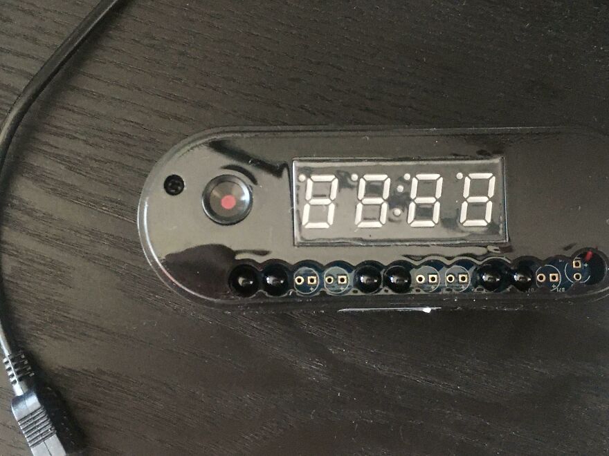 Defective digital clock with broken display at hotel