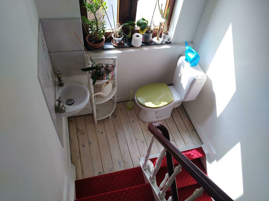 Toilet installed at top of stairs illustrating unsafe design in hotel booking fail