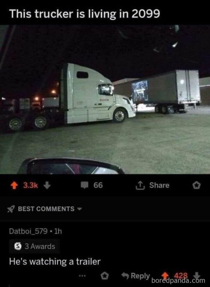 Truck parked facing a trailer screen, sarcastic comment about living in 2099