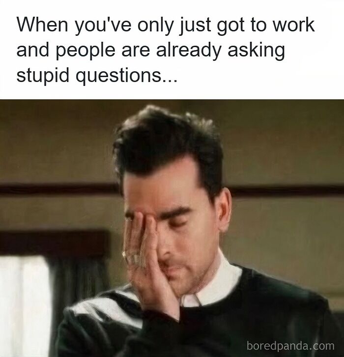 Man facepalming at stupid questions at work