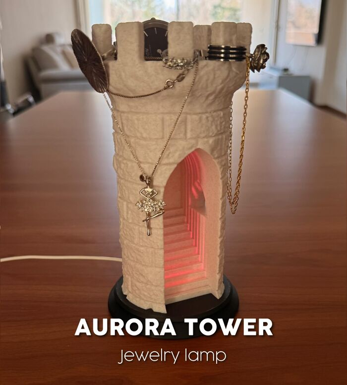 3D printed Aurora Tower jewelry lamp with hanging necklaces