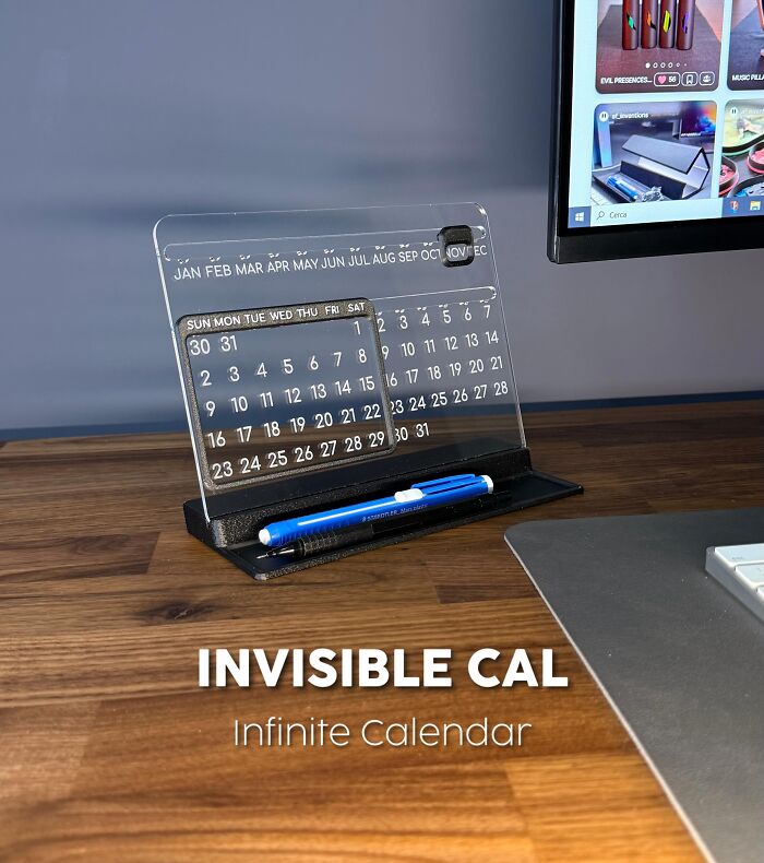 3D printed infinite invisible calendar with pen on desk