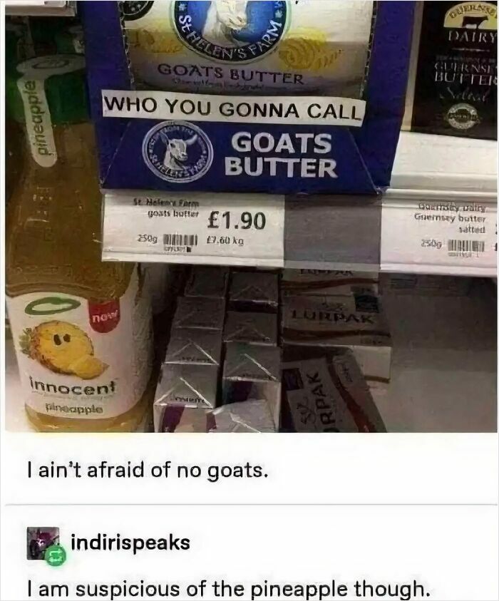 Funny grocery shelf sign saying who you gonna call goats butter with a pineapple drink nearby