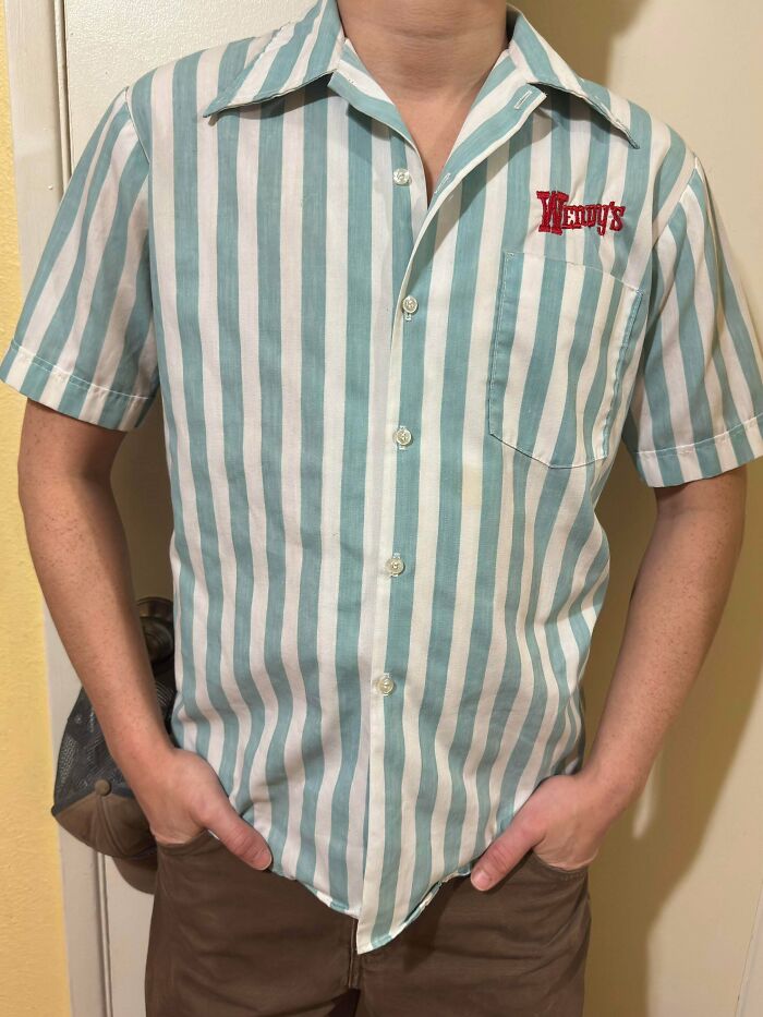 A vintage striped Wendy's employee uniform shirt, one of many retro thrift store finds.
