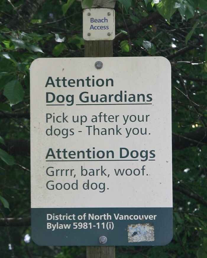A beach sign with instructions for dog guardians and funny dog barks, displaying humorous signs