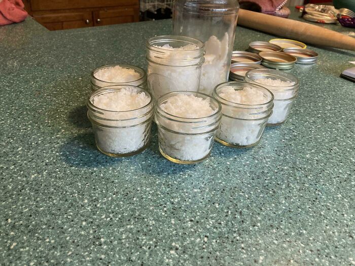Cool photos of glass jars filled with fresh white snow preserved in a kitchen