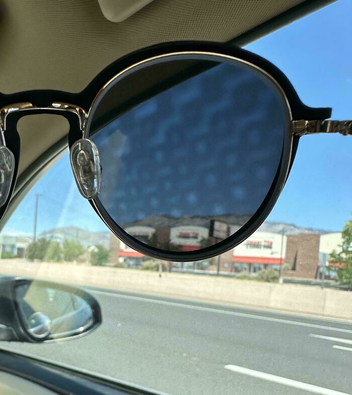 A polarization effect showing cool photos of a checkered sky through sunglasses