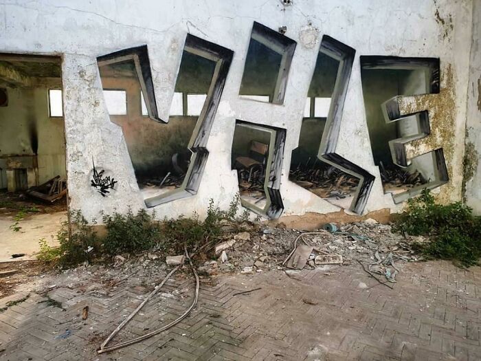 Interesting and cool photos of a wall with 3D graffiti letters painted to look like transparent windows
