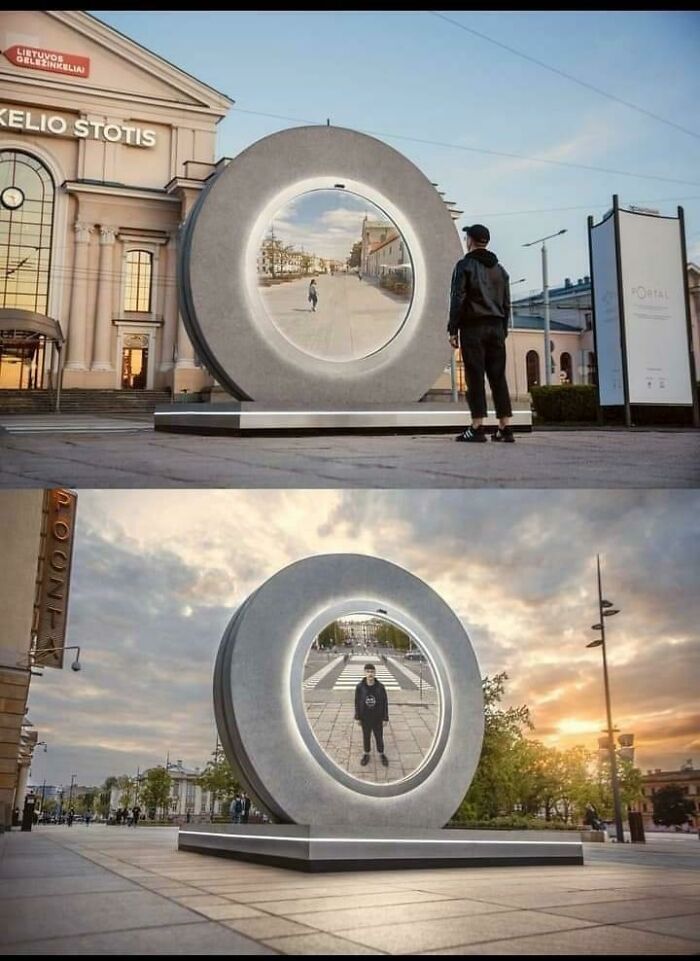 Large interactive portal screen displaying a live video feed connecting two different cities.