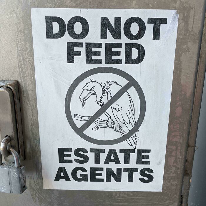 A sign saying Do Not Feed Estate Agents, showing frustrating renting and booking experiences