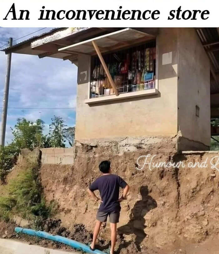 Humorous photo of a man looking at an inconveniently placed store on a hill