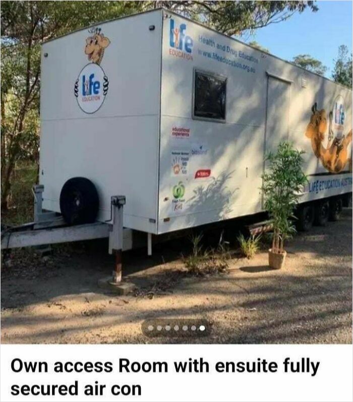 An old mobile trailer advertised as a renting and booking option with own access room and ensuite.