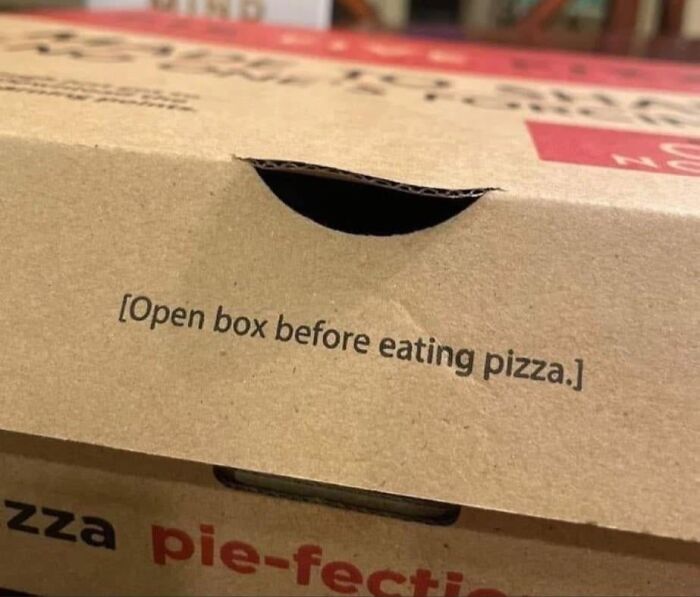 Pizza box with funny instruction to open box before eating pizza