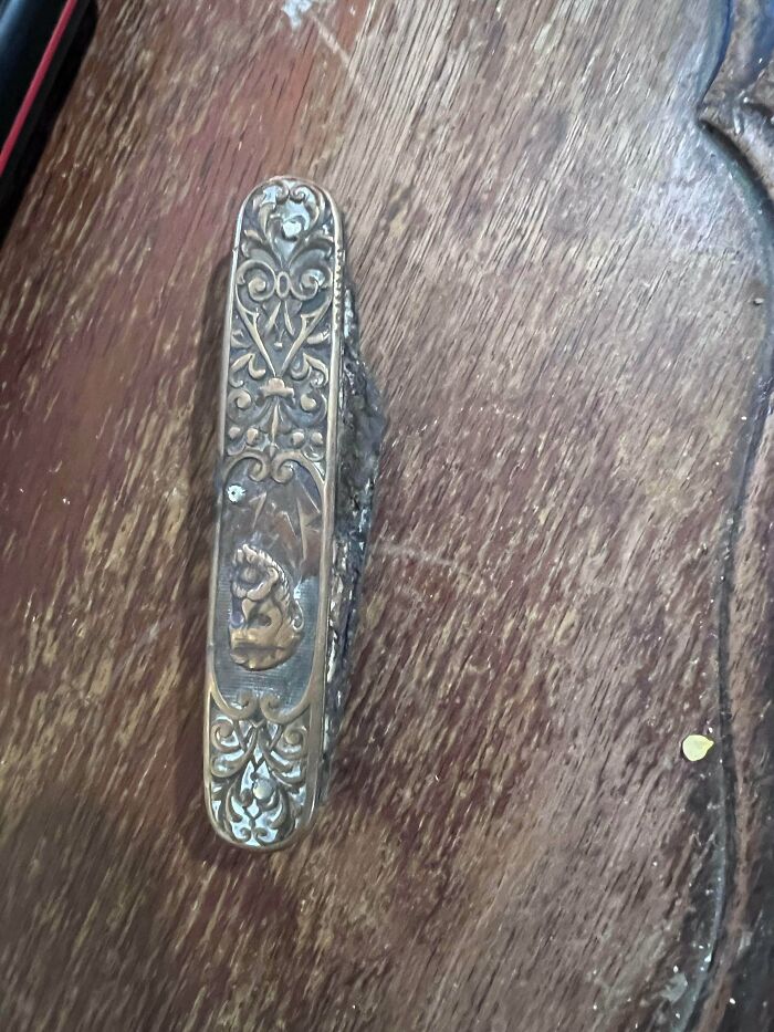 Engraved metal pocket knife, a unique old treasure for antique lovers