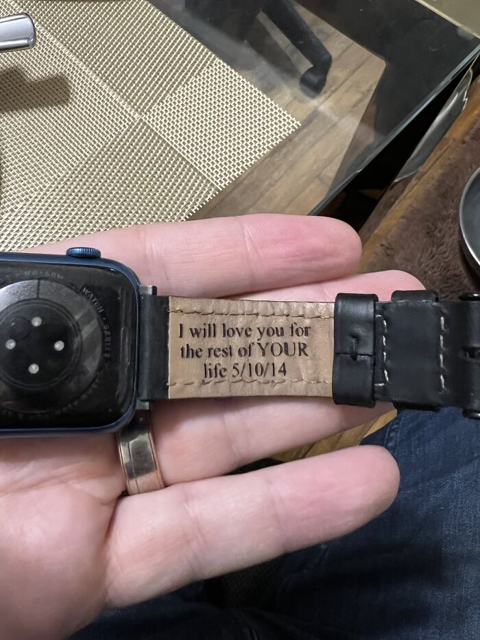 An engraved message on a watch strap illustrating funny things wives do